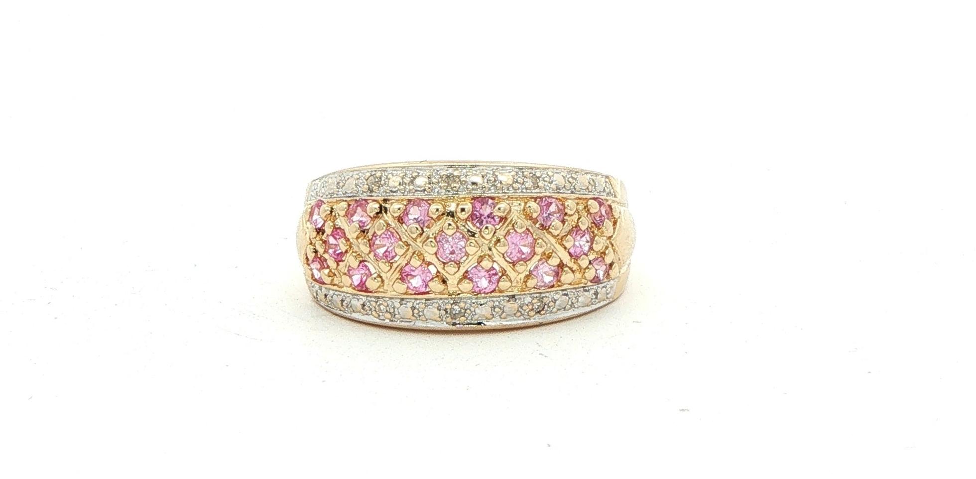 Estate Piece: Pink Sapphire and Diamond Criss-Cross Band Ring Yellow Gold (0.29cts TWT)