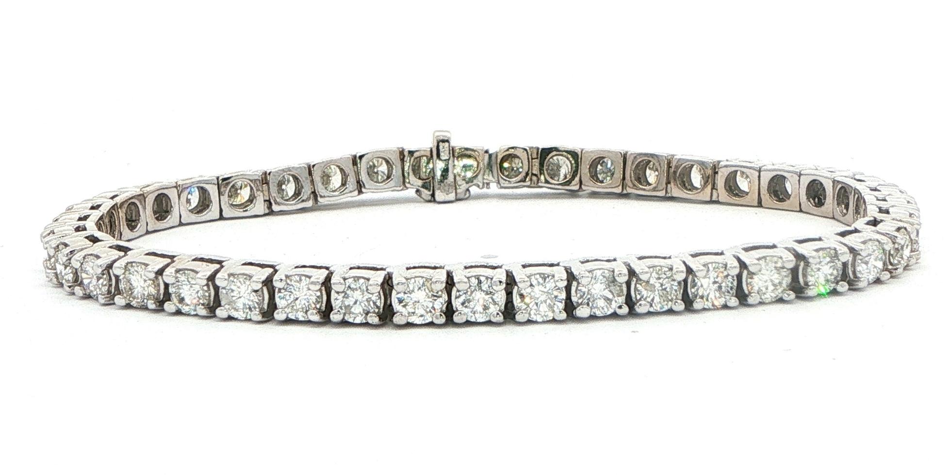 Estate Piece: Classic Diamond Tennis Bracelet in White Gold (6.56cts TWT)