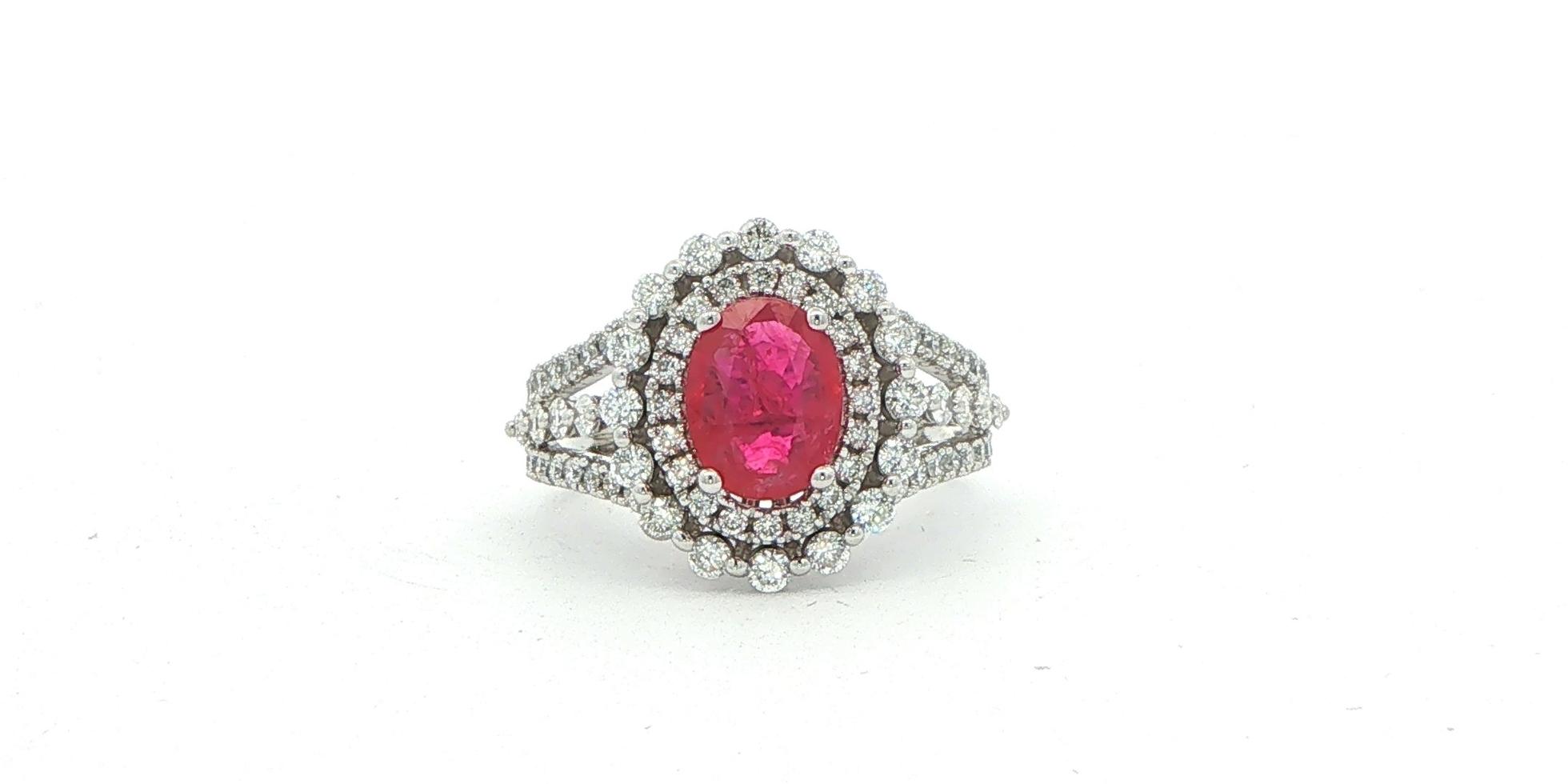Estate Piece: Double Halo Oval Ruby and Diamond Cocktail Ring with Split Shank in White Gold (2.50cts TWT)