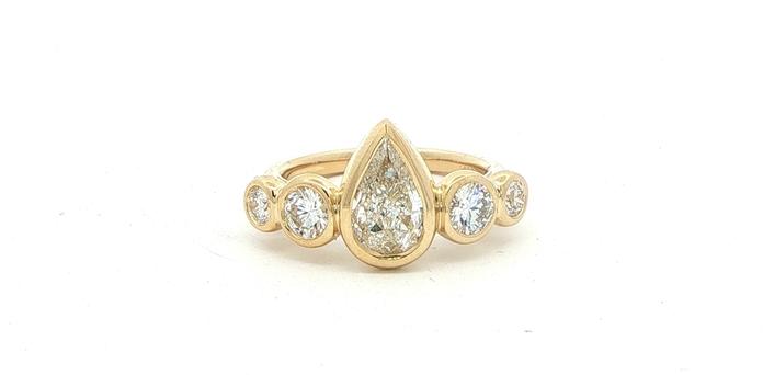 content/products/Pear-Cut Bezel Set Diamond Five-Stone Ring in Yellow Gold (1.71cts TWT)