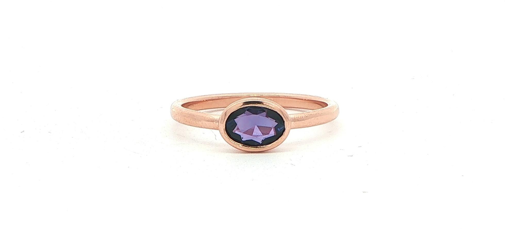 East-West Oval Huckleberry Sapphire Bezel Solitaire Ring in Rose Gold (0.65cts TWT)