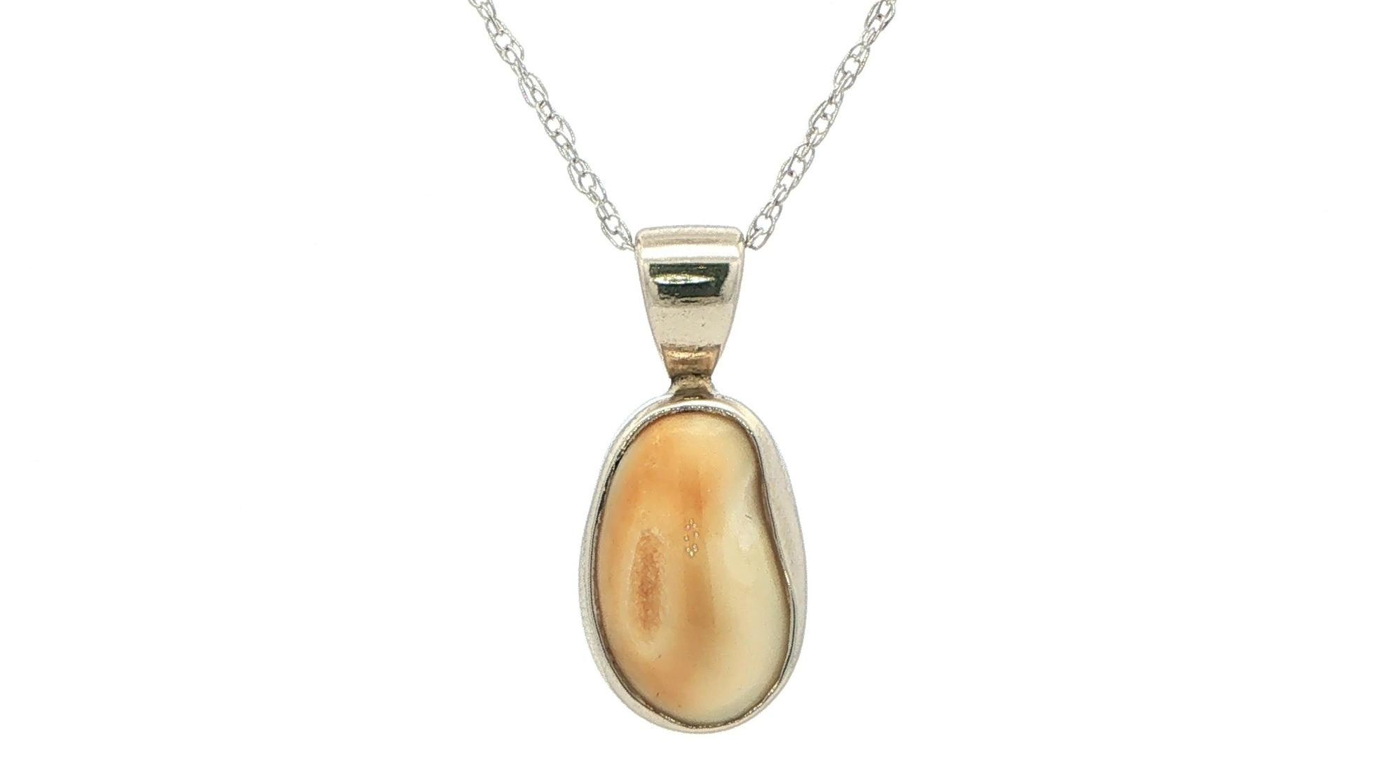 Estate Piece: Bezel-Set Elk Ivory Pendant Necklace in White Gold