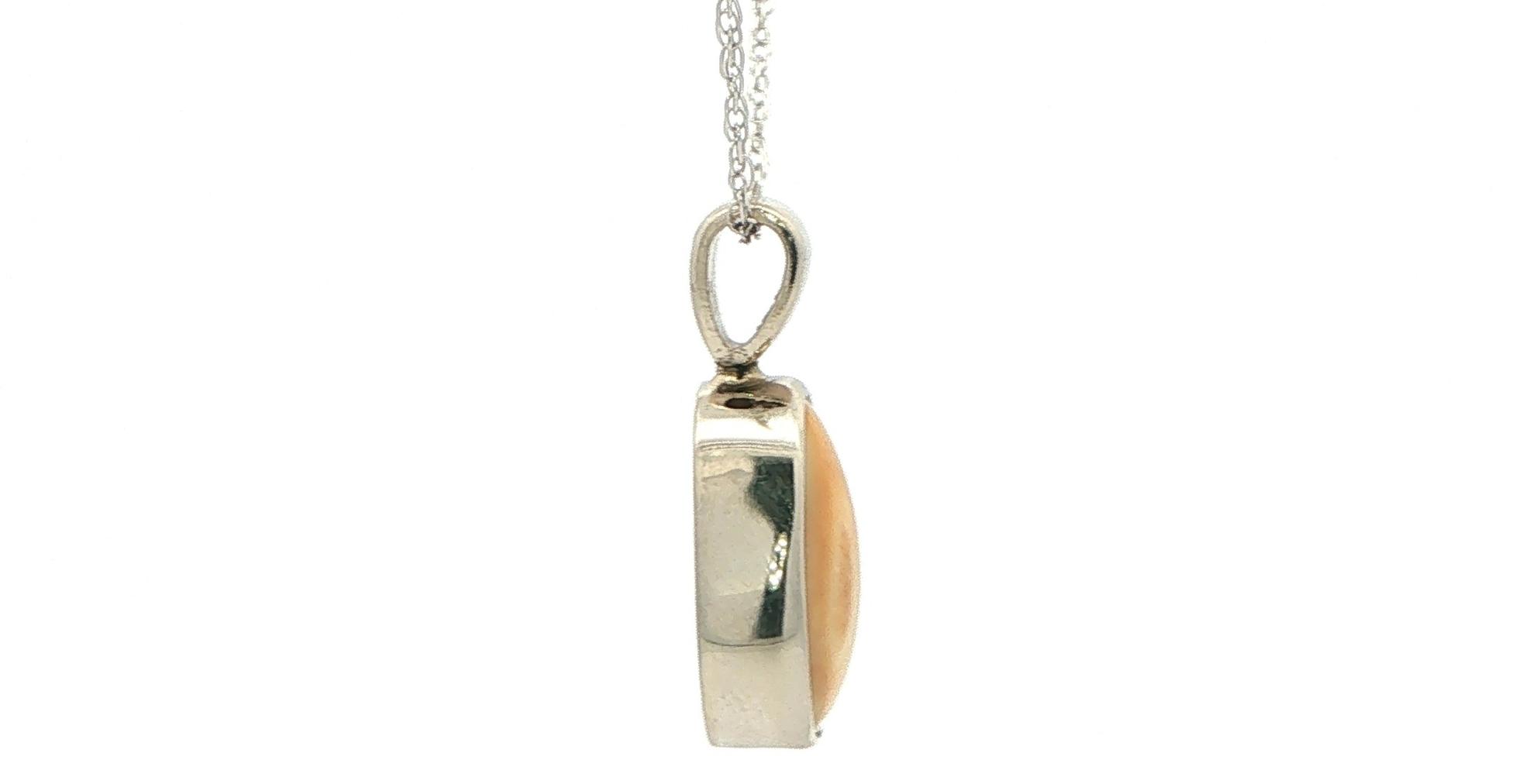 Estate Piece: Bezel-Set Elk Ivory Pendant Necklace in White Gold side
