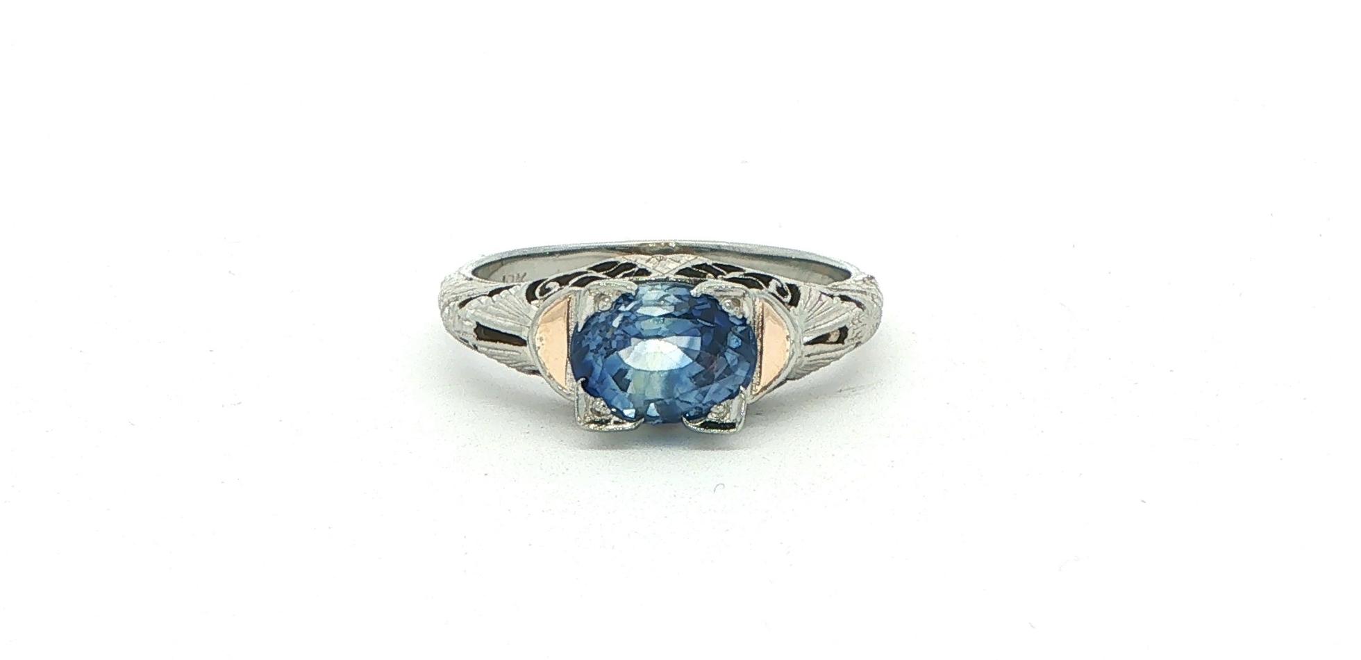 Estate Piece: Vintage Filigree East-West Oval Sapphire Solitaire Ring in White Gold (1.25cts TWT)